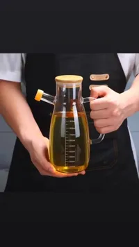 شاف زيت زجاجي مدرج مع غطاء خشبي