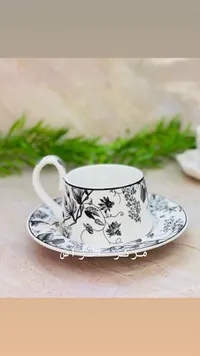 فنجان قهوة بنقوش زهرية - مركز الراس