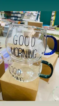كوب زجاجي بعبارة صباح الخير