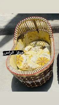مهد مواليد خوص تقليدي - مركز الراس