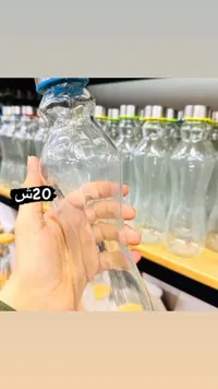 زجاجة مياه زجاجية بتصميم عصري - سوق غزة