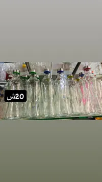 زجاجة مياه زجاجية أنيقة - سوق غزة