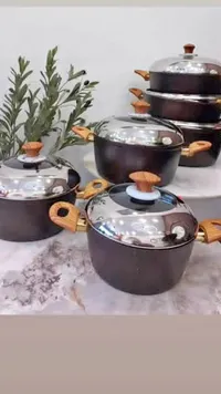 طقم قدور جرانيت بمقابض خشبية