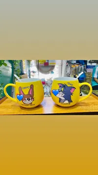 مج سيراميك برسومات توم وجيري مع ملعقة