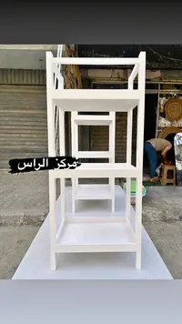رفوف تخزين خشبية متعددة الطوابق - مركز الراس