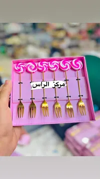طقم شوك تقديم بتصميم المصاصة - مركز الراس