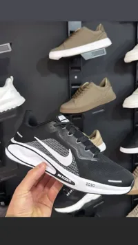 حذاء رياضي Nike Zoom أسود وأبيض