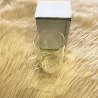 كوب زجاجي شفاف بمقبض