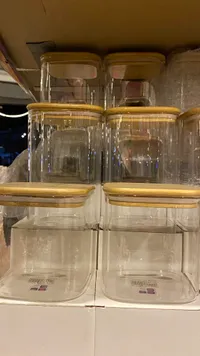 مرطبان تخزين زجاجي بغطاء خشبي