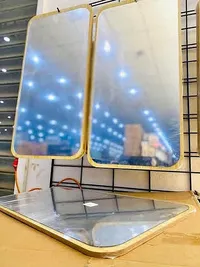 مرآة ديكور بإطار خشبي
