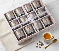 طقم أكواب قهوة بتصميم خطوط ذهبية (12 قطعة)