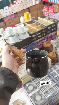 غلاية جرانيت بمقبض خشبي