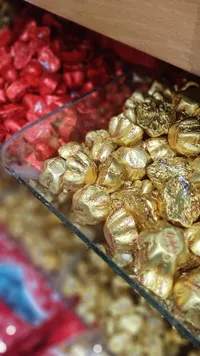قطع شوكولاتة جولدن برالين (Golden Pralines)