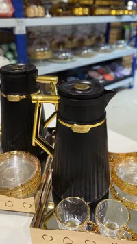 طقم تيرمس وفناجين قهوة فاخر - أسود وذهبي