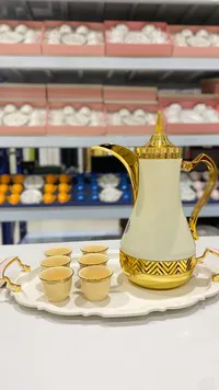 طقم قهوة عربية - تيرمس وفناجين ذهبي