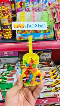 حلوى على شكل كمان - سوق غزة