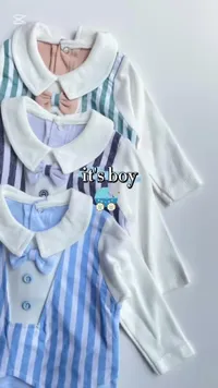 تشكيلة ملابس مواليد بأطواق بيضاء وخطوط ملونة