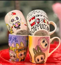 أكواب سيراميك بتصاميم كرتونية وعصرية