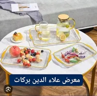طقم صواني تقديم زجاجية مع مقابض ذهبية