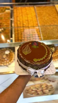 كعكة الشوكولاتة والحلويات الشرقية - حلويات القاضي (Al Qadi Sweets)