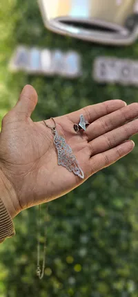مجموعة سنسال وخاتم فضي مزخرف