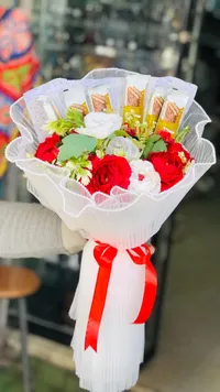باقة زهور فاخرة مع شوكولاتة بيليجيوم