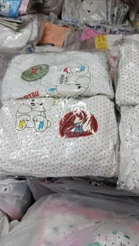 تشكيلة ملابس أطفال برسومات كرتونية