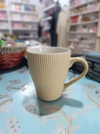 كوب سيراميك بتصميم مضلع - بيج
