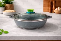قدر حجري بغطاء زجاجي
