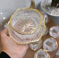 طبق زجاجي بحافة ذهبية