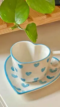 طقم كوب وصحن سيراميك بتصميم قلب