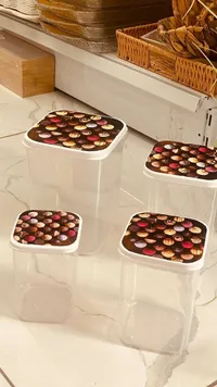 طقم علب تخزين بلاستيكية شفافة بغطاء مزخرف