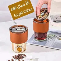كوب زجاجي مع غطاء جلدي وقشة - سوق غزة