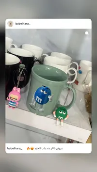مج سيراميك برسومات إم آند إمز مع ميدالية (M&M's)