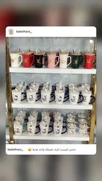 مج سيراميك بغطاء وملعقة بتصاميم متنوعة