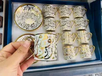طقم فناجين قهوة مزخرفة بالخط العربي