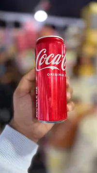 مشروب غازي كوكاكولا الأصلي (Coca-Cola)