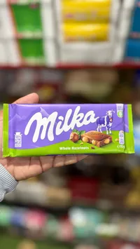 شوكولاتة بالحليب مع البندق الكامل - ميلكا (Milka)