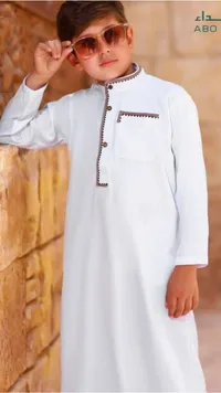 ثوب أطفال فاخر بأبيض ناصع