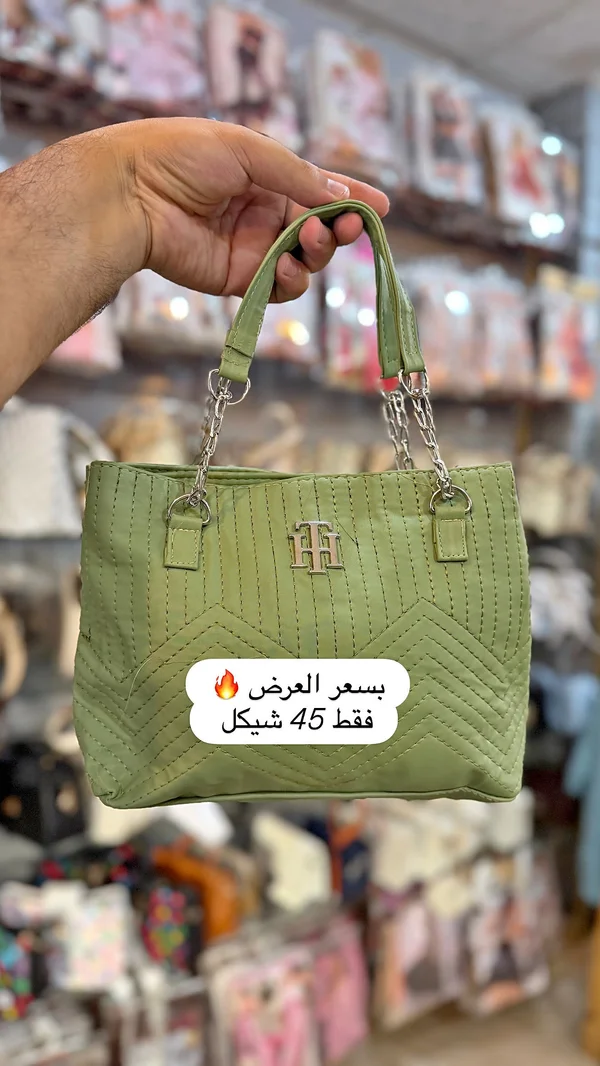 حقيبة يد نسائية - تومي هيلفيغر (Tommy Hilfiger) - أحذية وحقائب نسائية - سوق غزة