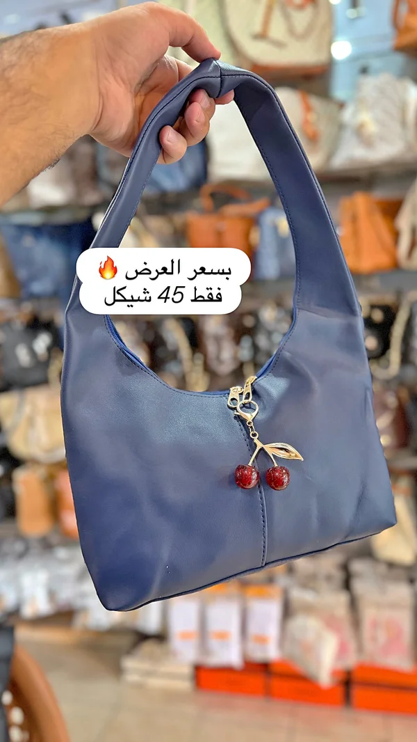 حقيبة يد نسائية - أحذية وحقائب نسائية - سوق غزة