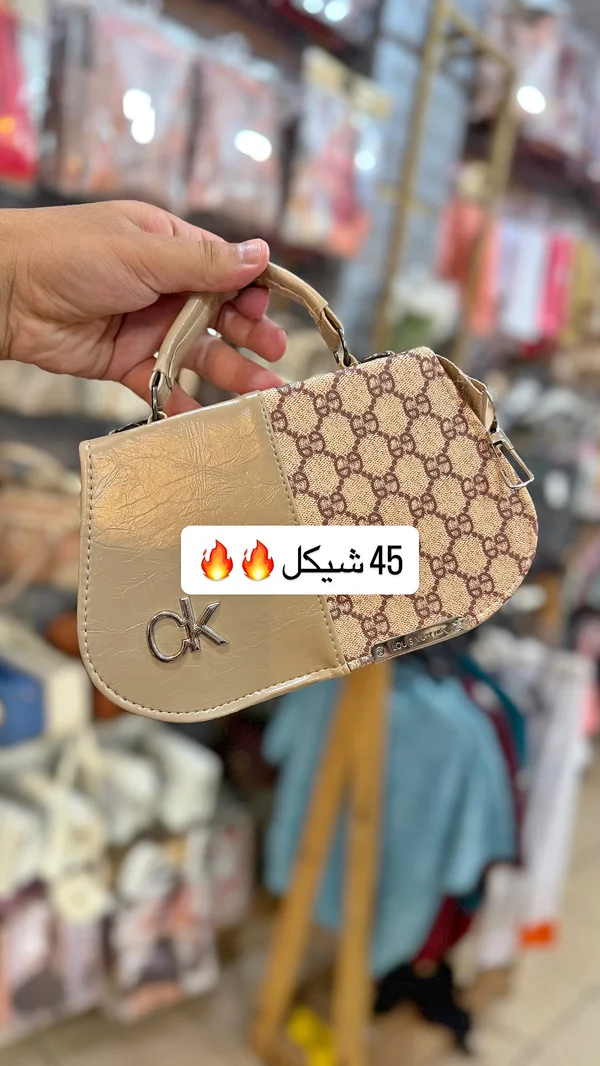 محفظة حريمي - سي كيه (CK) - أحذية وحقائب نسائية - سوق غزة