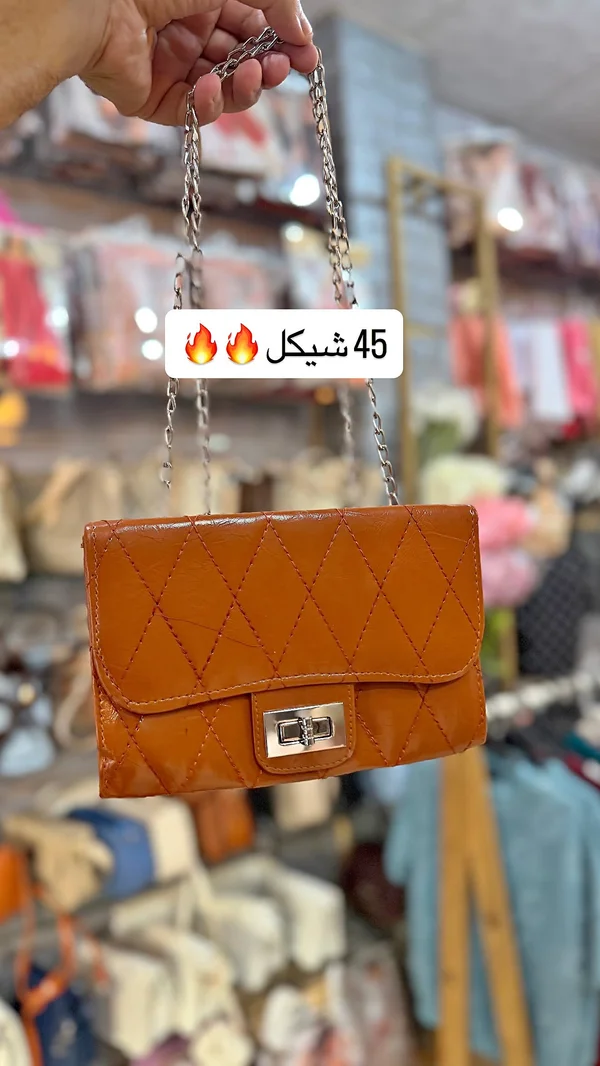 حقيبة كتف نسائية لامعة - أحذية وحقائب نسائية - سوق غزة