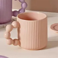 كوب بتصميم كرات لطيف