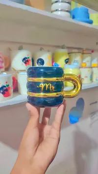 كوب بتصميم Mr. (Mr.)