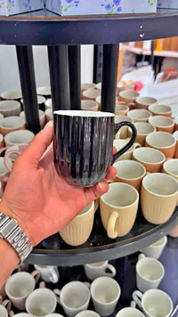 كوب قهوة أسود مقلم