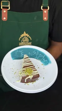 قطعة كيك الشوكولاتة - مطعم وملحمة الملكي