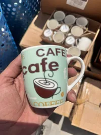 كوب سيراميك بتصميم القهوة