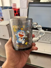 كوب زجاجي بتصميم دورايمون (Doraemon)