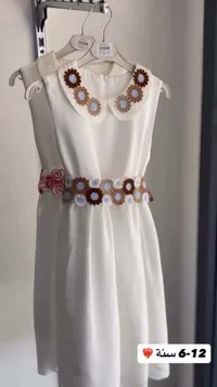 فستان أبيض مزين بالكروشيه - دينا ستور (Dina Store)